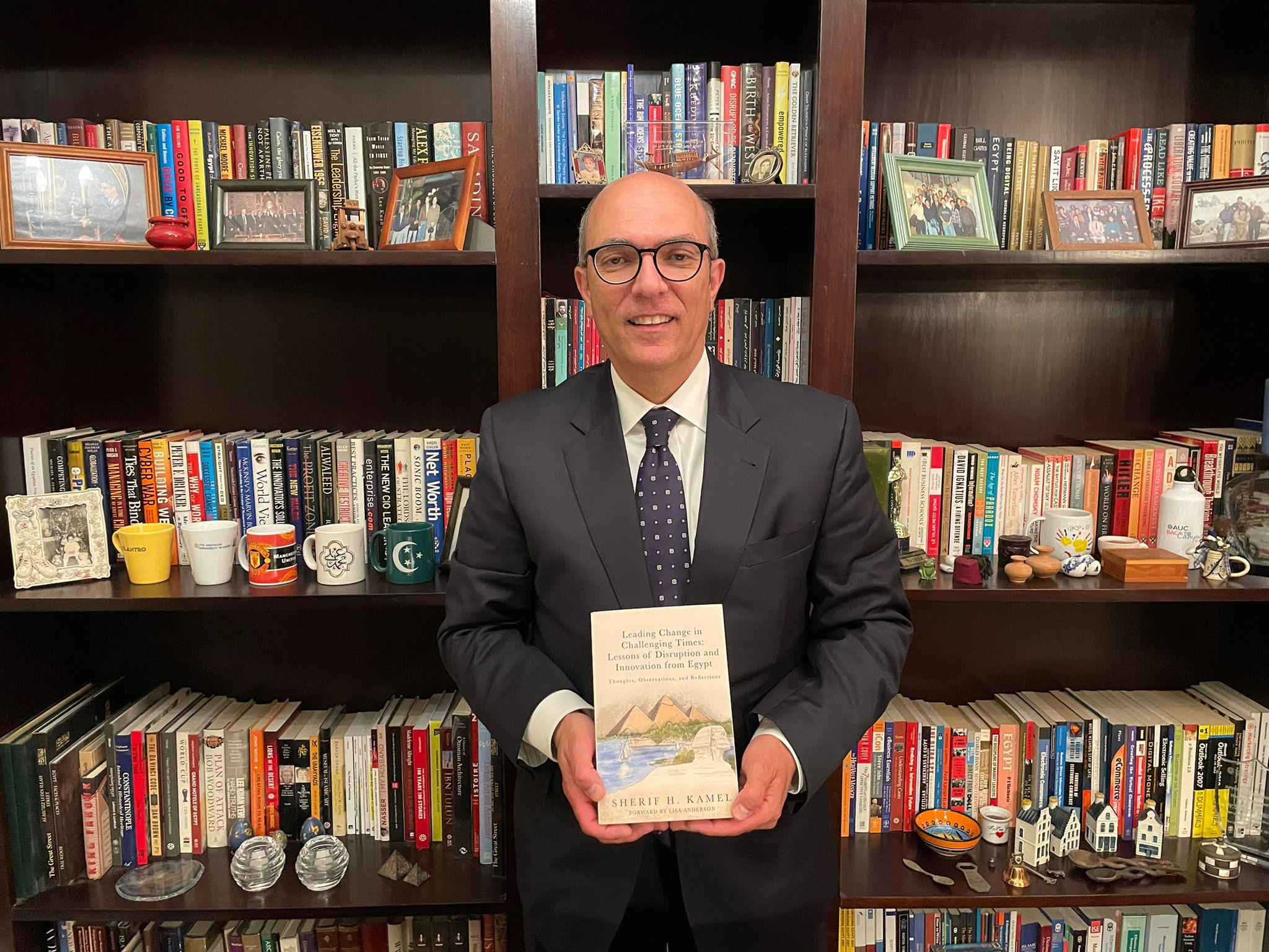 Sherif Kamel holds his debut book