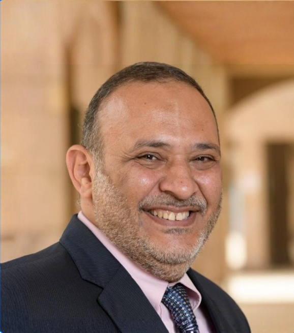 Headshot of a man smiling