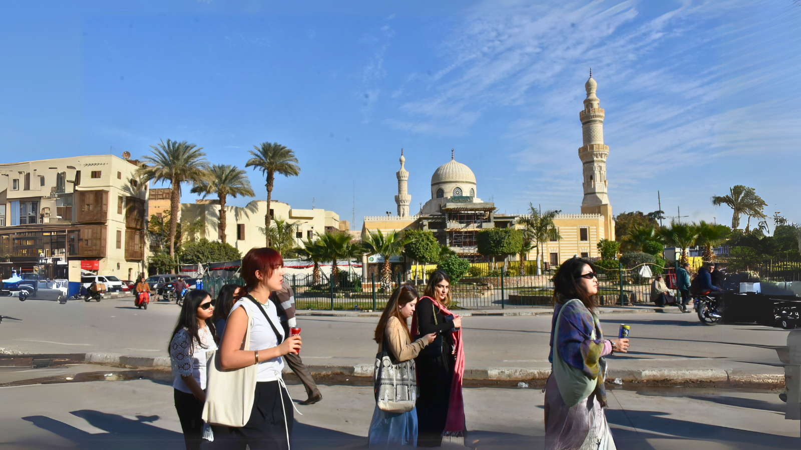 Columbia students on the Egypt Trek walk in front of a mosque