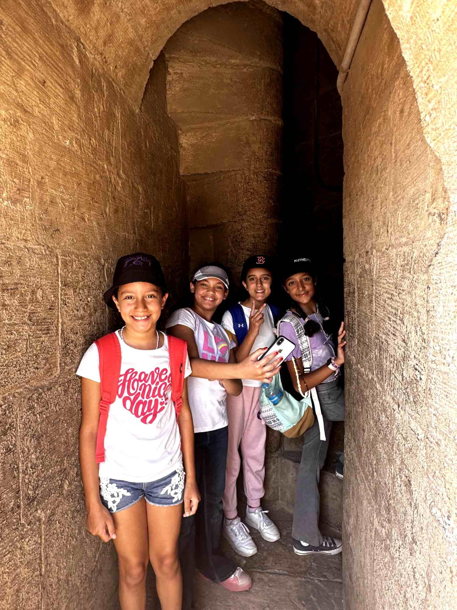 Kids smiling at monumental site