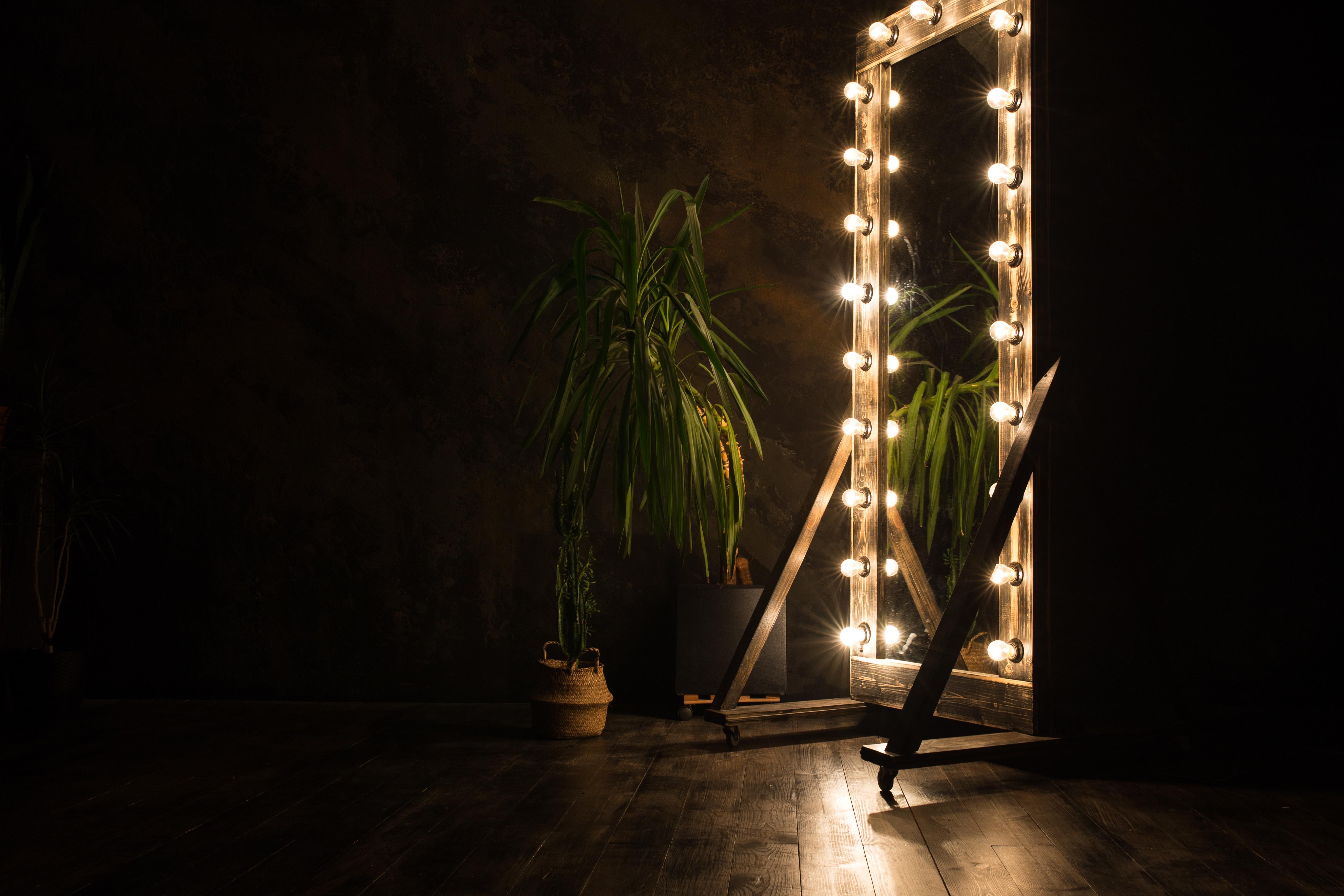 Mirror with light bulbs frames on a stage