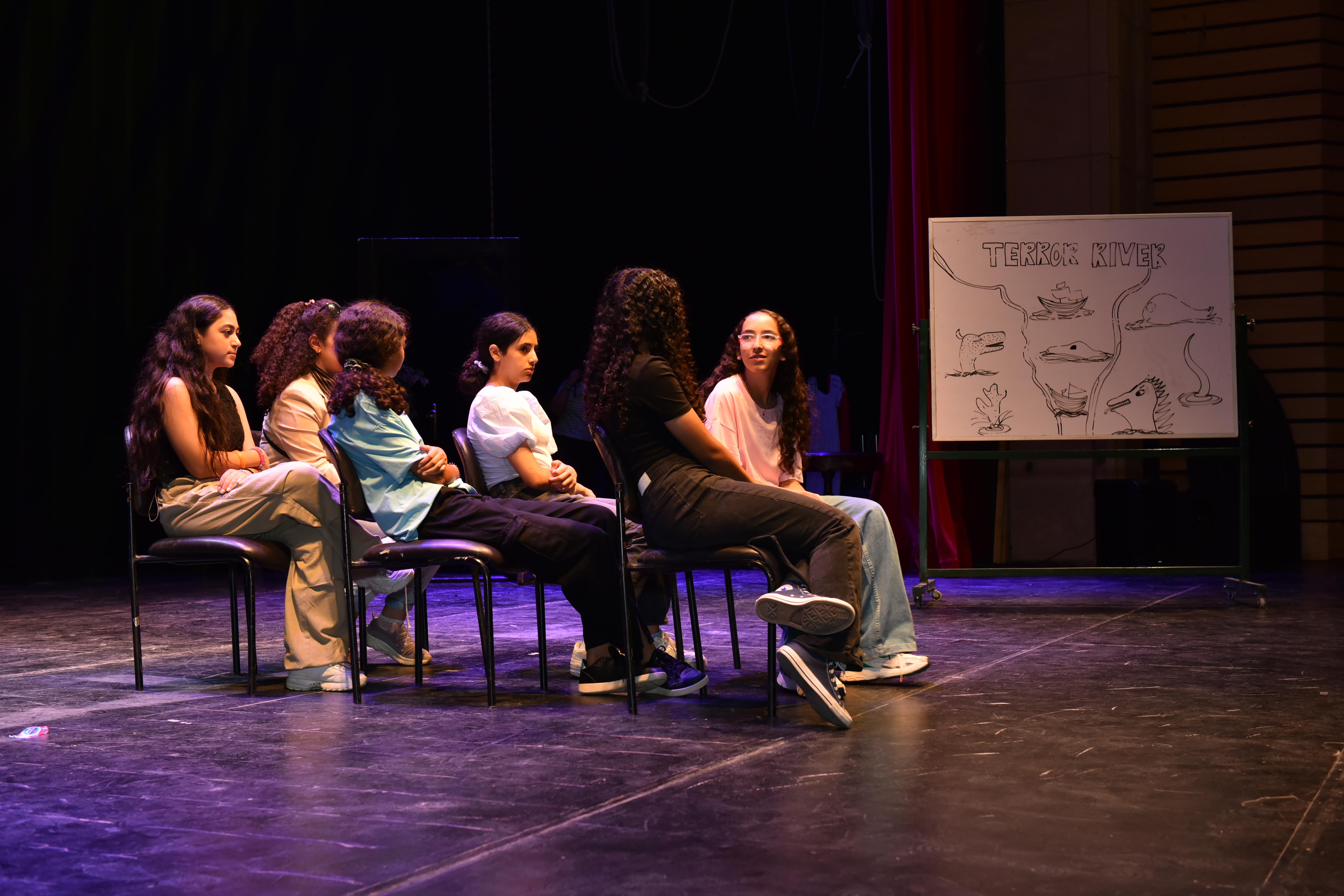 Students on stage acting