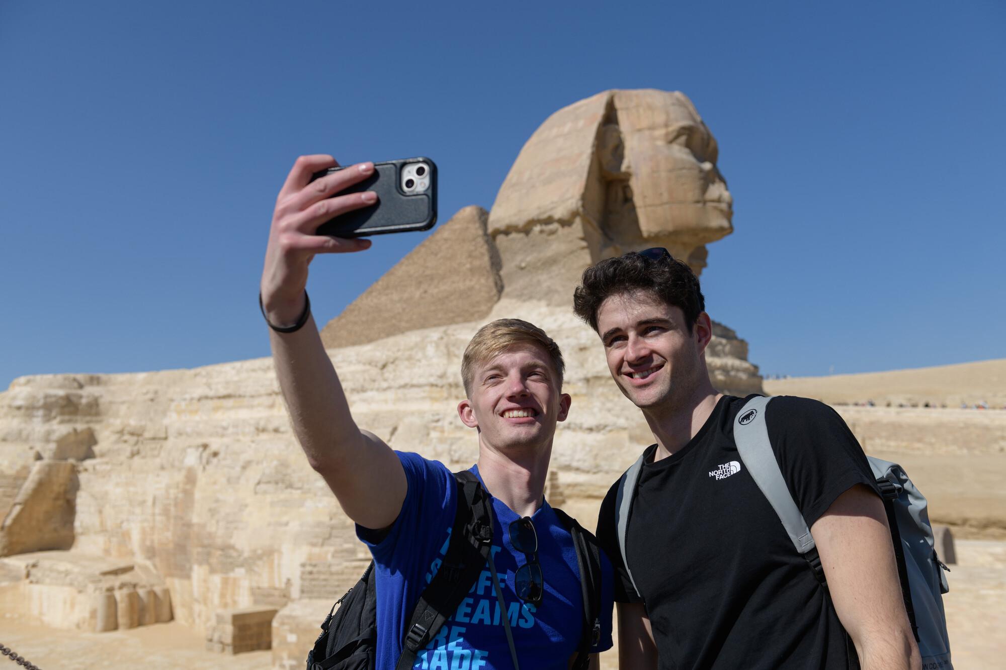 two boys taking a selfie at the sphinx