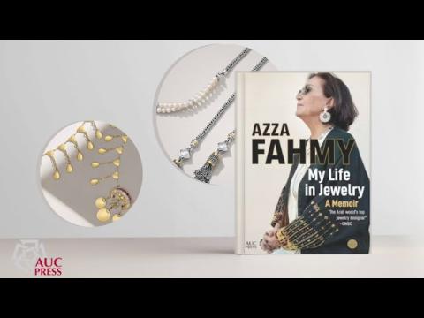 A picture of a book with a woman wearing glasses on the cover. Text on Book: Azza Fahmy My Life in Jewelry. There are pictures of jewelry