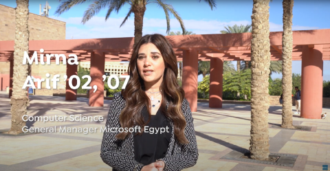 A woman is talking outdoors. Text: Mirna Arif '02, '07. Computer Science, General Manager Microsoft Egypt