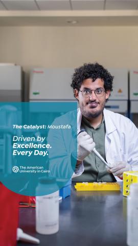 a student with curly black hair wearing glasses and a lab coat