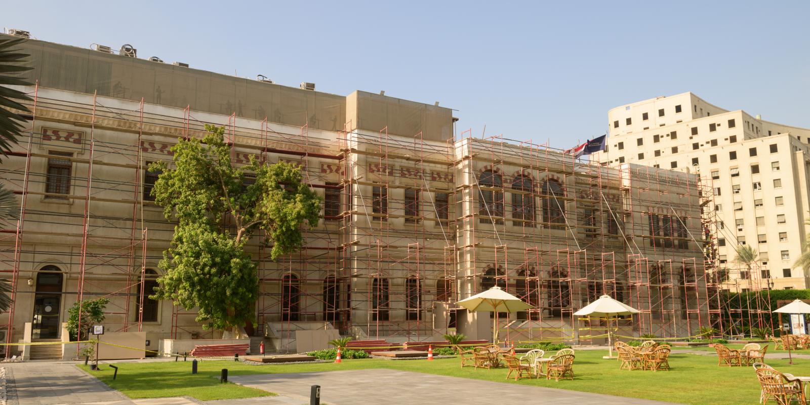 Tahrir palace and courtyard with scaffolding over the facade