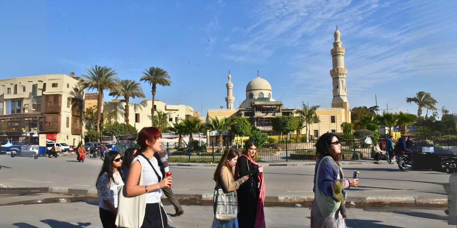 Columbia students on the Egypt Trek walk in front of a mosque