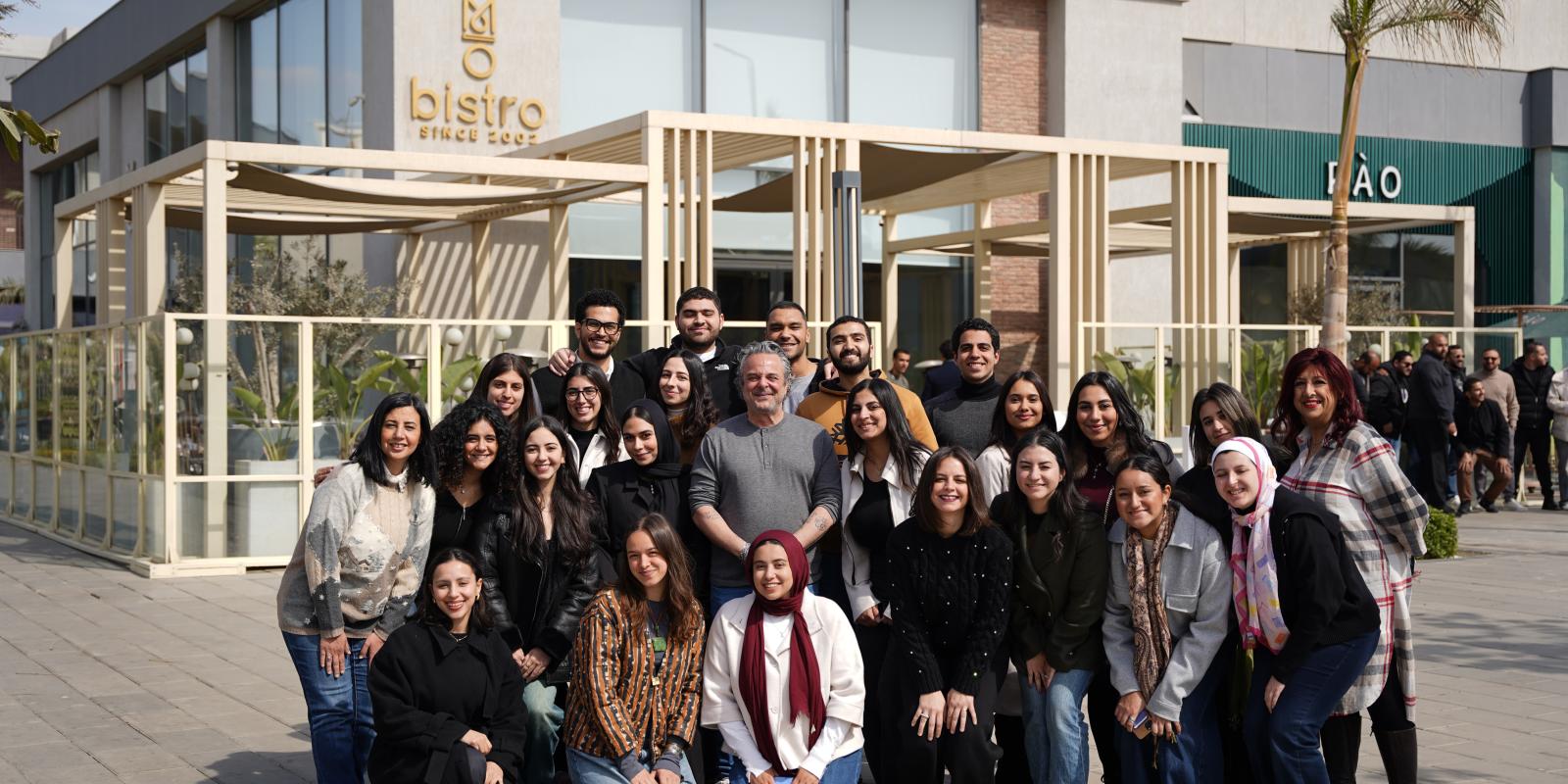 Group photo with Mohamed Abdelhak infront of Mo Bistro 