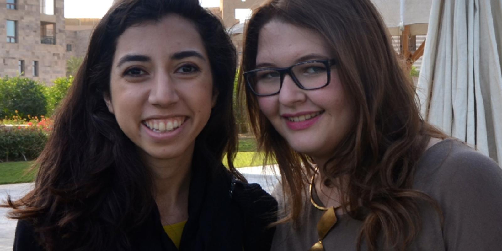 two girls smiling