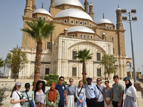 Foreign males and females in front of the Citadel