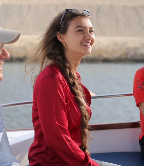 Maha smiles while on a felucca